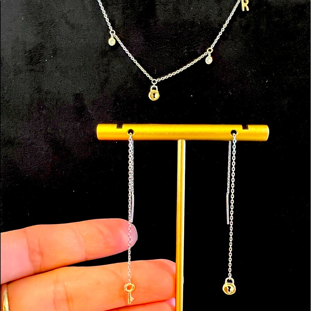 A set of Silver necklace and earrings